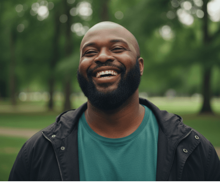 Man smiling outdoors